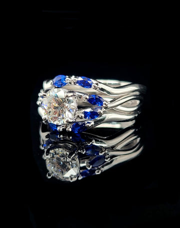 18kt white gold custom engagement ring  featuring a one carat center stone