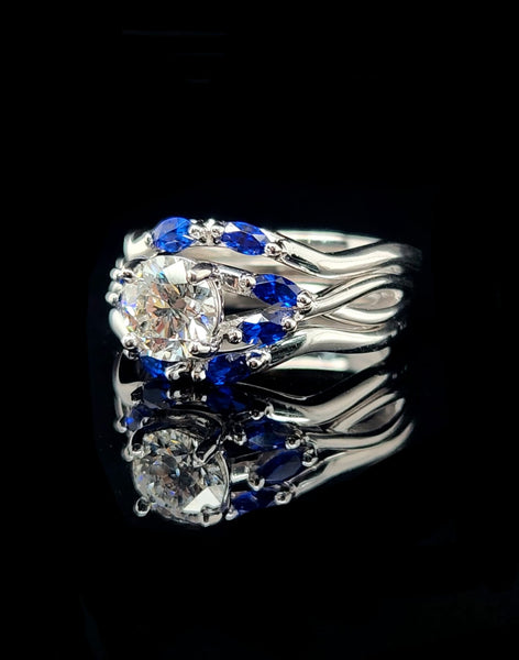 18kt white gold custom engagement ring  featuring a one carat center stone