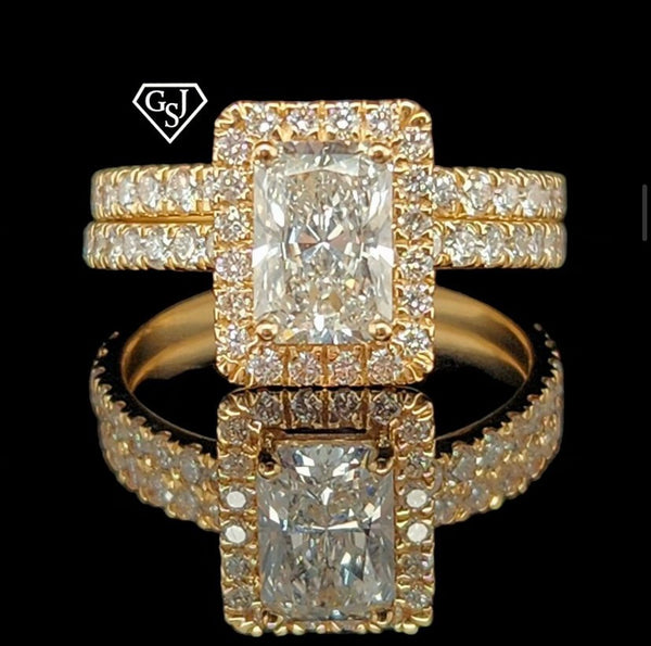 14K Gold and features a dazzling 1.18CT Emerald-Cut diamond