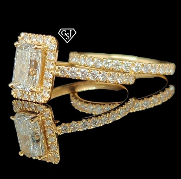 14K Gold and features a dazzling 1.18CT Emerald-Cut diamond