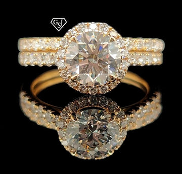 14K set featuring a 1.28CT Center diamond