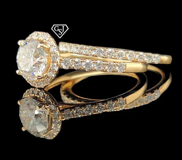 14K set featuring a 1.28CT Center diamond