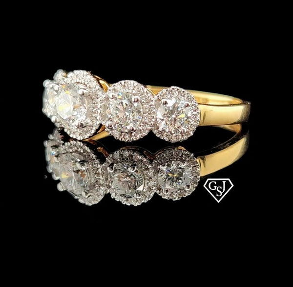 five stones in the center of the cluster total 0.91CTs on their own, and each larger stone has a halo of smaller diamonds for maximum sparkle