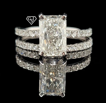 14K wedding set features a gorgeous 2.09CT Emerald Cut Diamond