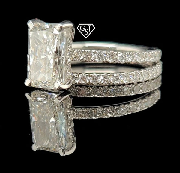 14K wedding set features a gorgeous 2.09CT Emerald Cut Diamond