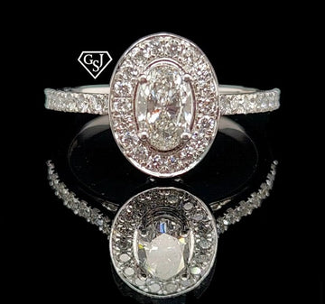 10k Gold Engagement ring features a 0.53CT Oval Diamond