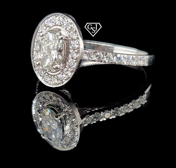 10k Gold Engagement ring features a 0.53CT Oval Diamond