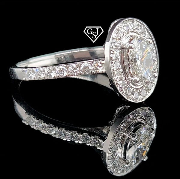 10k Gold Engagement ring features a 0.53CT Oval Diamond