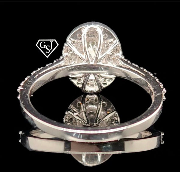 10k Gold Engagement ring features a 0.53CT Oval Diamond