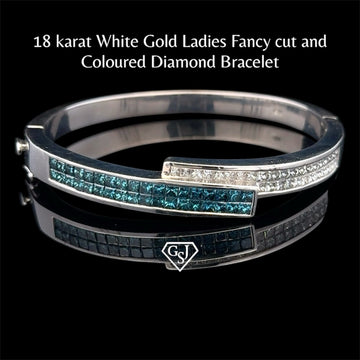 18KT White Gold Ladies Fancy Cut and
Coloured Diamond Bracelet