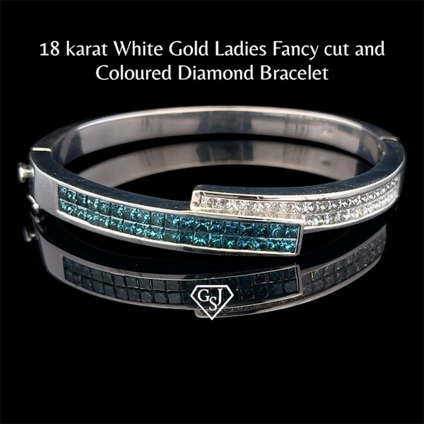 18KT White Gold Ladies Fancy Cut and
Coloured Diamond Bracelet