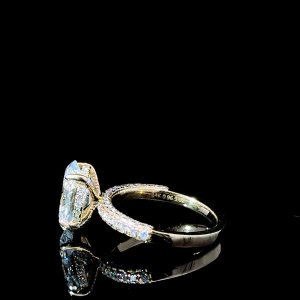 “Feast your eyes on this stunning 3.87 carat total diamond weight lab-grown Oval diamond engagement ring. Set in luxurious 18kt yellow gold, this show-stopper is guaranteed to turn heads at any occasion.”